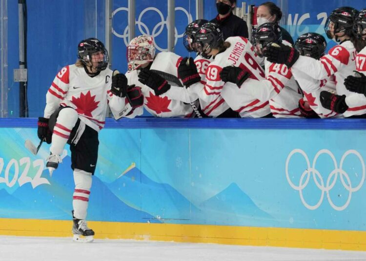 Canada's Marie-Philip Poulin (29) celebrates after scoring on a penalty shot against the United States during a preliminary round women's hockey game at the 2022 Winter Olympics, Tuesday, Feb. 8, 2022, in Beijing.