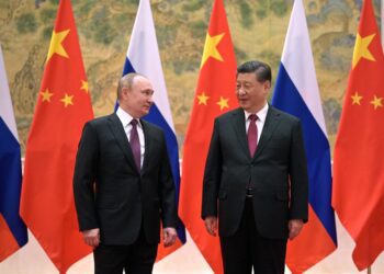 Amid crisis in Ukraine, Putin in Beijing praises China ties