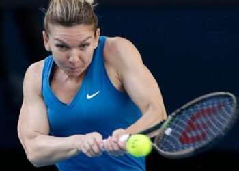 Halep moves past Riske in Dubai opener