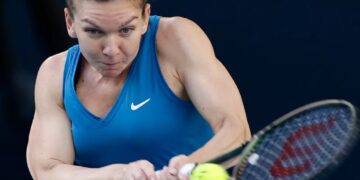 Halep moves past Riske in Dubai opener