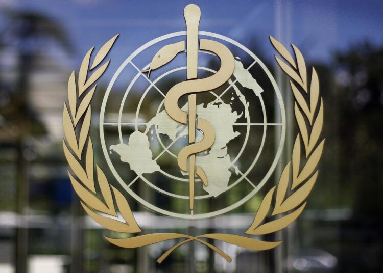 FILE - The logo of the World Health Organization is seen at the WHO headquarters in Geneva, Switzerland, June 11, 2009. The World Health Organization chief on Tuesday, Feb. 1, 2022 says 90 million cases of coronavirus have been reported since the omicron variant was first identified 10 weeks ago, amounting to more than in all of 2020, the first year of the Covid-19 pandemic.