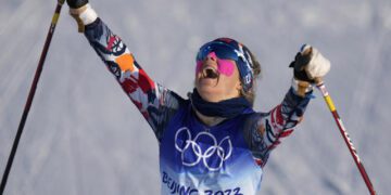 Johaug wins 1st gold medal of Beijing Olympics in skiathlon