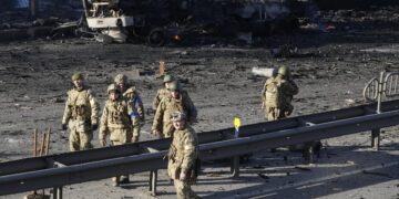 Russian troops press on Kyiv; Ukraine president to fight on