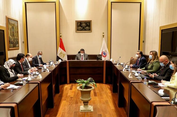 Egyptian Acting Minister of Health Khaled Abdel Ghaffar during his meeting with a number of officials.