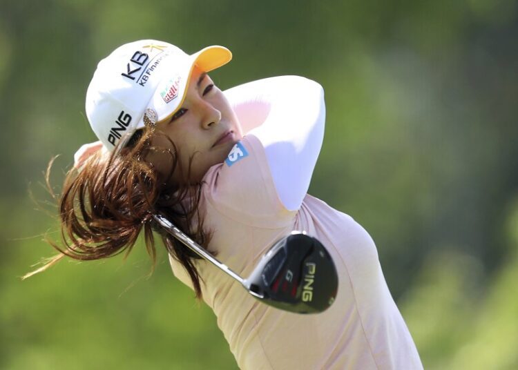 In Gee Chun of South Korea plays a shot from the eighth tee during her third round at the Women's World Championship of golf at Sentosa Golf Club in Singapore, Saturday, March 5, 2022.