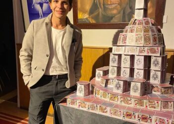 Building his own world out of cards