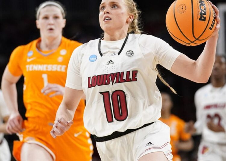 Louisville's Hailey Van Lith (R) heads to the basket against Tennessee in the NCAA women's tournament in Wichita.