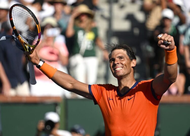 Mar 16, 2022; Indian Wells, CA, USA;  Rafael Nadal (ESP) celebrates after defeating Reilly Opelka (USA) in the fourth round at the BNP Paribas Open at the Indian Wells Tennis Garden. Mandatory Credit: Jayne Kamin-Oncea-USA TODAY Sports