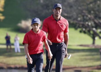 Woods wins inaugural Player Impact Program, collects US$8m