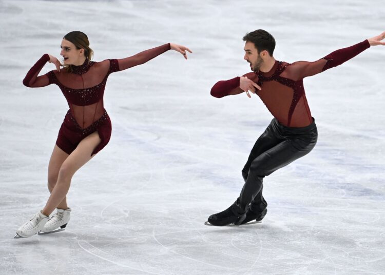 France's Gabriella Papadakis and Guillaume Cizeron compete in the Figure Skating World Championships in Montpellier, south of France.