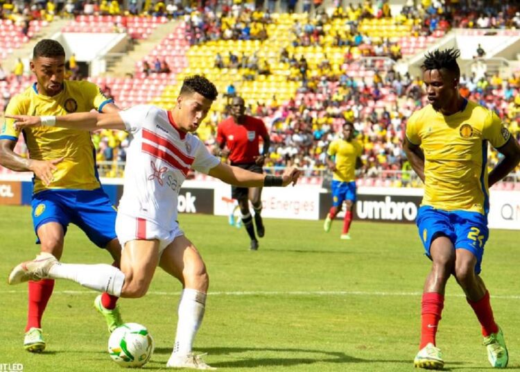 Petro picks point against Zamalek as Sundowns claim win at CAF Champions League 1 - Egyptian Gazette Zamalek’s midfielder Imam Ashour (C) vying for the ball against Petro de Luanda players.