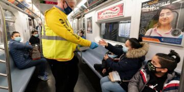 US extends mask rule for travel while weighing new approach
