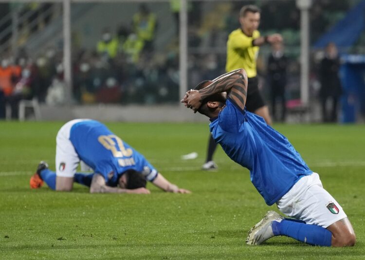 Italy's Joao Pedro reacts after missing a scoring chance in the World Cup qualifying play-off match against North Macedonia, in Palermo, Italy.