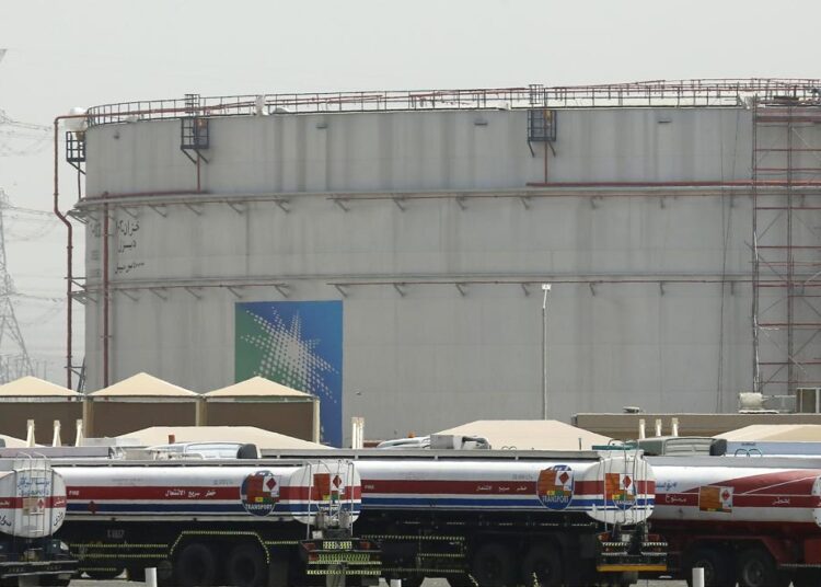 A file photo showing fuel trucks line up in front of storage tanks at the North Jiddah bulk plant, an Aramco oil facility, in Jiddah, Saudi Arabia, on March 21, 2021.