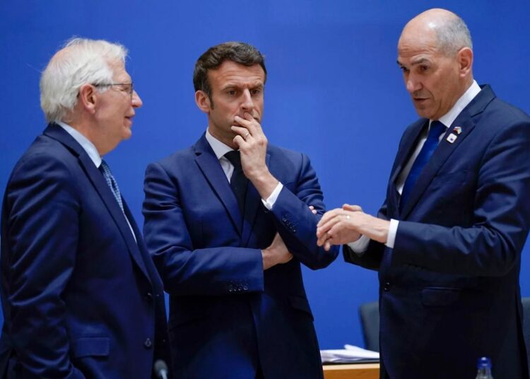 Putin's demand for ruble payments? No way! say EU nations 1 - Egyptian Gazette European Union High Representative for Foreign Affairs and Security Policy Josep Borrell Fontelles, left, French President Emmanuel Macron, center, and Slovenian Prime Minister Janez Jansa talk during a round table meeting at an EU summit in Brussels, on March 24, 2022.