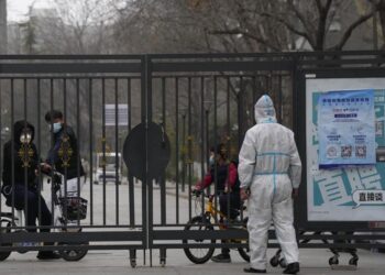 China’s virus cases rise, access to Shanghai tightened
