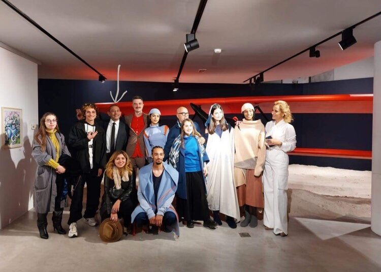 Artists can sell online 1 - Egyptian Gazette Hady Salem, founder of Artlova, together with a group of artisits in one of the exhibitions in Tunis.
