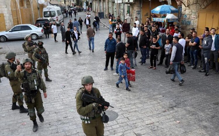 Palestinians say man killed in Israeli West Bank raid 1 - Egyptian Gazette Israeli soldiers during clashes following a protest in the city center of the West Bank city of Hebron, 22 April 2022.
