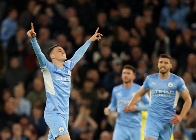 Soccer Football - Premier League - Manchester City v Brighton & Hove Albion - Etihad Stadium, Manchester, Britain - April 20, 2022 Manchester City's Phil Foden celebrates scoring their second goal Action Images via Reuters/Molly Darlington EDITORIAL USE ONLY. No use with unauthorized audio, video, data, fixture lists, club/league logos or 'live' services. Online in-match use limited to 75 images, no video emulation. No use in betting, games or single club /league/player publications.  Please contact your account representative for further details.