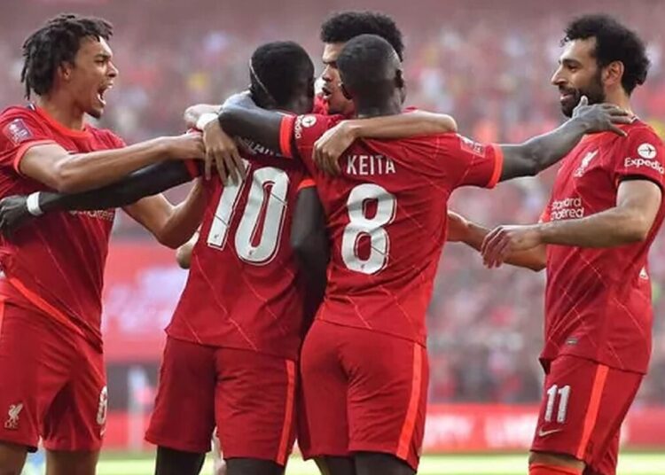 Liverpool’s players celebrate after scoring against Manchester City in their FA Cup semi-final match.