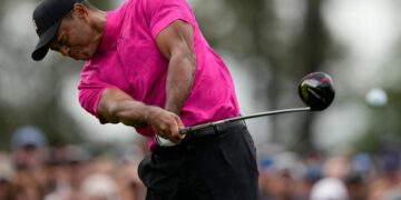 Woods in Masters hunt after opening 71