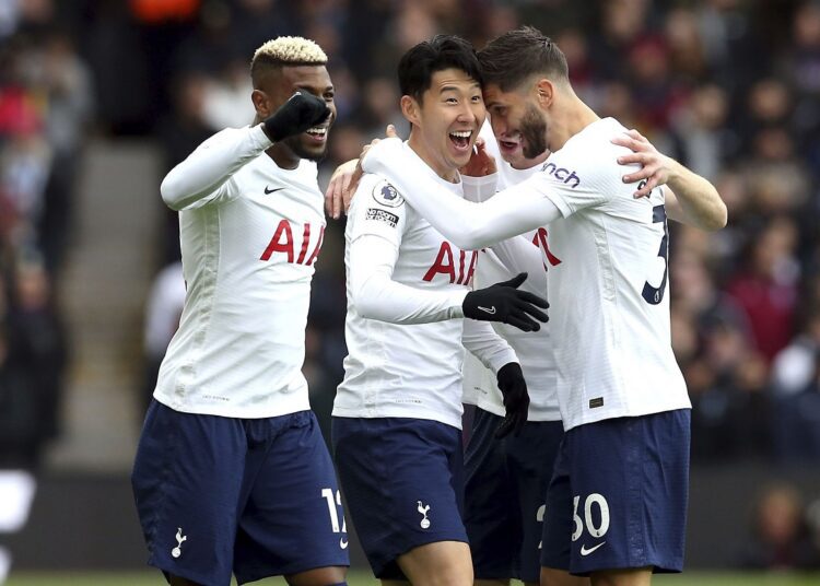 Tottenham Hotspur's Son Heung-min (C) celebrates scoring during the English Premier League match against Aston Villa.