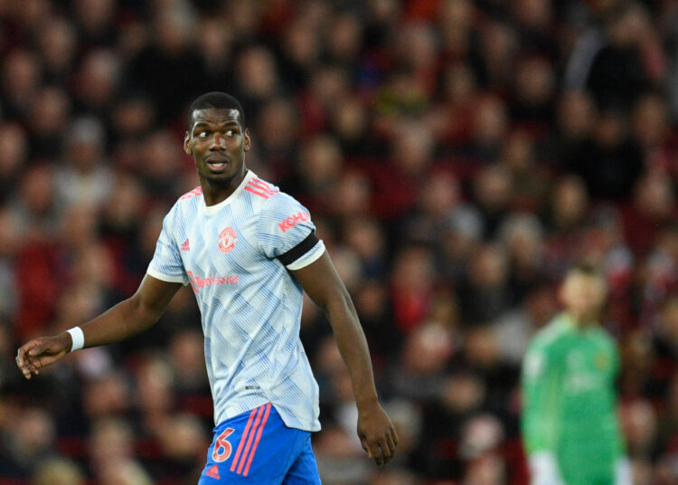 Manchester United midfielder Paul Pogba reacts during the English Premier League match against Liverpool at Anfield in Liverpool, north-west England, April 19, 2022.