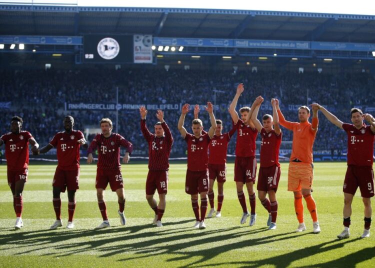 Bayern Munich players celebrate after the match against Arminia Bielefeld at Bielefelder Alm, in Bielefeld.