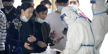 Beijing on alert after COVID-19 cases discovered in school