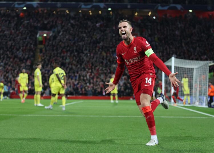 Soccer Football - Champions League - Semi Final - First Leg - Liverpool v Villarreal - Anfield, Liverpool, Britain - April 27, 2022 Liverpool's Jordan Henderson celebrates after Villarreal's Pervis Estupinan scored Liverpool's first with an own goal after deflecting a shot by Henderson Action Images via Reuters/Carl Recine