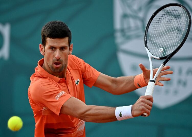 Djokovic survives scare to beat Djere in Belgrade 1 - Egyptian Gazette Serbia's Novak Djokovic returns a ball to Serbia's Laslo Djere during their tennis single match at Serbia Tennis Open ATP 250 series tournament in Belgrade on April 20, 2022. (Photo by ANDREJ ISAKOVIC / AFP)