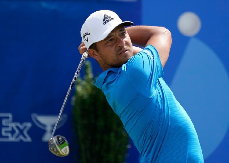 Xander Schauffele hits off the first tee during the second round of the PGA Zurich Classic golf tournament, at TPC Louisiana in Avondale, Louisiana.