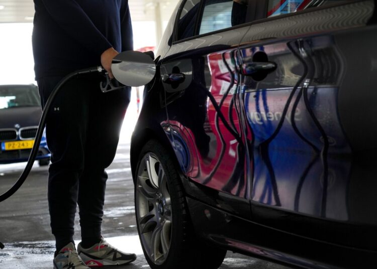 Motorists in the Netherlands headed to the pumps after a government reduction in duties on fuel entered into force to help motorists hit by soaring fuel prices, in Amsterdam on April 1, 2022.