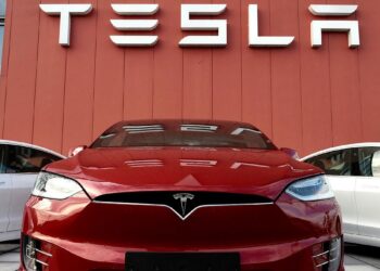 Tesla races ahead of rising costs with price hikes