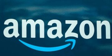 Amazon reports rare quarterly loss as online shopping slows  s