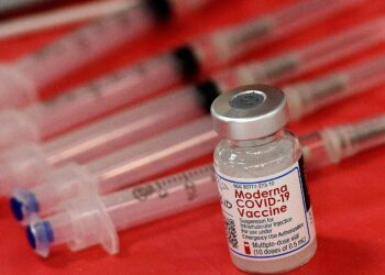 US charges 21 people with COVID-related fraud