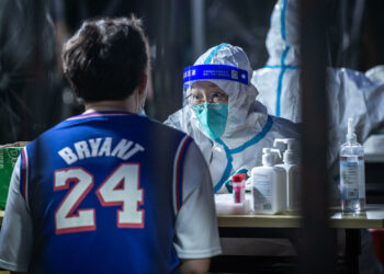 Beijing tightens Covid restrictions as long holiday begins