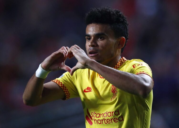 Liverpool's Luis Diaz celebrates scoring their third goal against Benfica at Estadio da Luz, Lisbon.