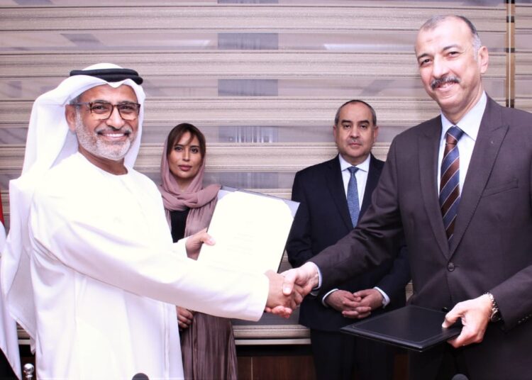 Minister of Civil Aviation Mohamed Manar and UAE Ambassador in Cairo Maryam al-Kaabi witnessing the signing ceremony