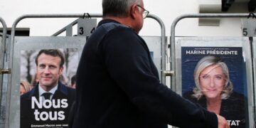 Macron confident as far-right rival closes in ahead of vote