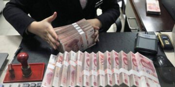 China cuts reserve requirements for banks as economy slows
