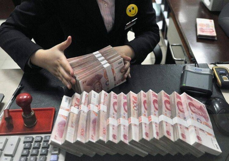 China said on Friday it would cut the amount of cash that banks must hold as reserves for the first time this year, releasing about 530 billion yuan ($83.25 billion) in long-term liquidity to bolster a sharp slowdown in economic growth.