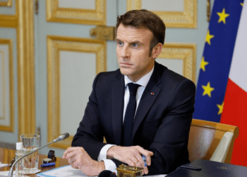 Macron hits out at Le Pen, regrets entering election race late