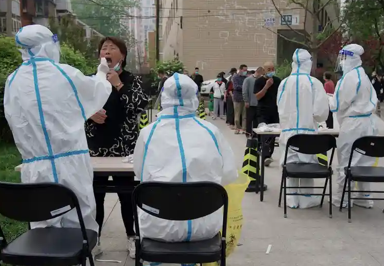 Mass testing is under way in Beijing to try and stamp out a coronavirus outbreak.