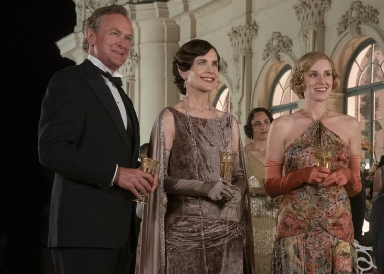 Something old, something new — the costumes of Downton Abbey 1 - Egyptian Gazette This image released by Focus Features shows Hugh Bonneville, from left, Elizabeth McGovern and Laura Carmichael in a scene from "Downton Abbey: A New Era."