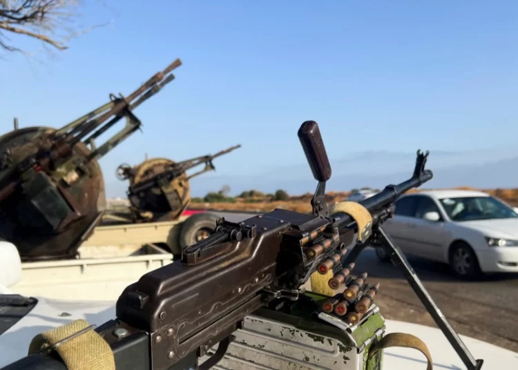 Military vehicles mounted with heavy weapons belonging to pro-PM Dbeibah Constitution Protection Force are pictured in Tripoli, Libya, May 17, 2022.
