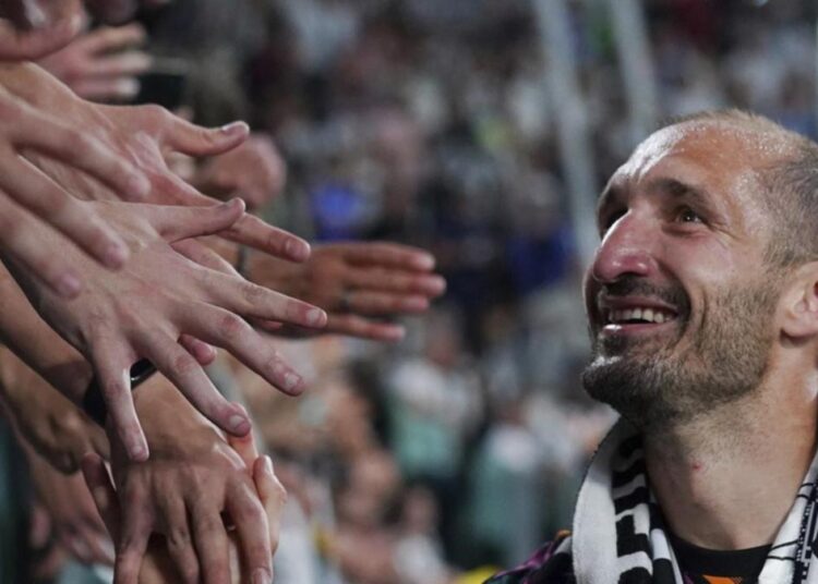 Juventus's Giorgio Chiellini greeted by fans during the Serie A match against Lazio in Turin.