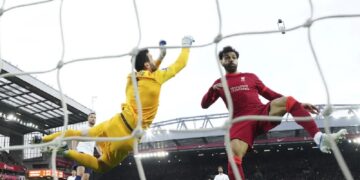 Liverpool suffers title blow in draw with Spurs
