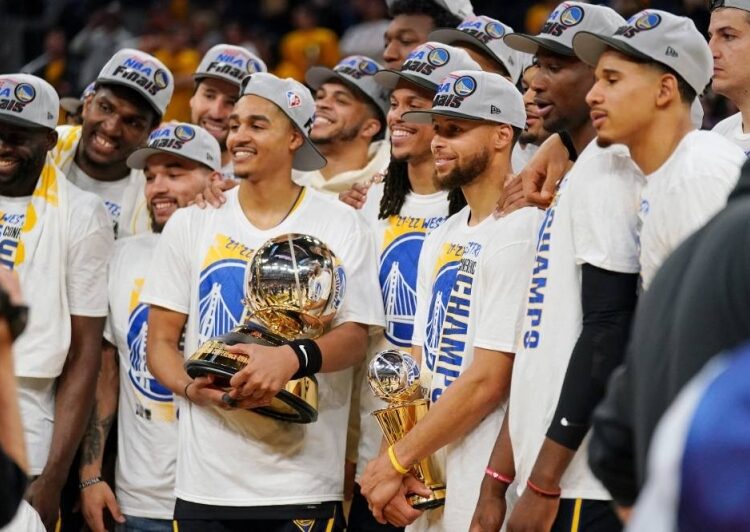 The Golden State Warriors celebrate after winning game five of the 2022 western conference finals against the Dallas Mavericks at the Chase Centre.