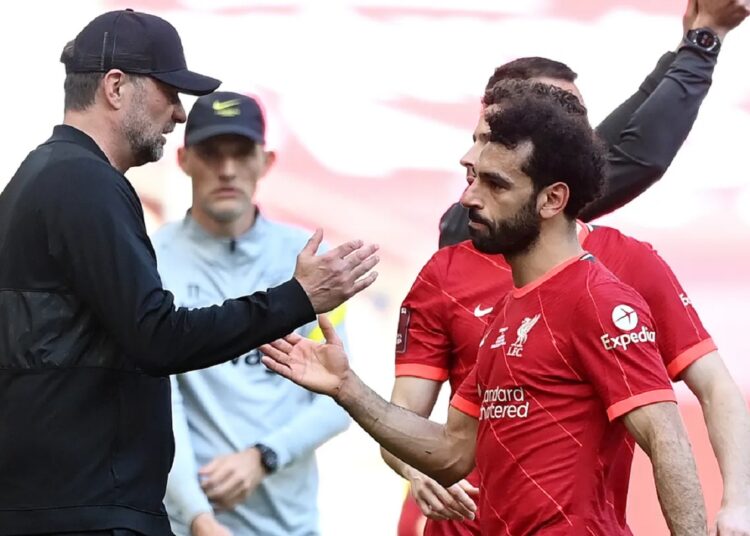 Liverpool's Mohamed Salah with manager Jurgen Klopp after being substituted at the FA Cup - Final against Chelsea on May 14, 2022.